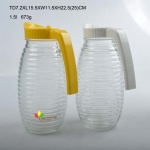 Glass jug with plastic handle
