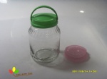 Glass storage jar with plastic lid