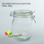 Glass jar with colorful clips