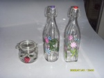 Glass milk bottle with hand painted design